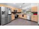 Modern kitchen featuring stainless steel appliances, and light wood cabinetry at 11845 Autumn Creek Dr, Riverview, FL 33569