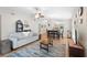 Cozy living room featuring neutral walls, wood-look floors, ceiling fan, and an open floor plan at 11845 Autumn Creek Dr, Riverview, FL 33569