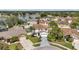 An aerial view of the property showcasing the home's location within a tranquil lakeside community at 1204 Rinkfield Pl, Brandon, FL 33511