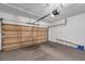 The garage is spacious with a large door, plenty of room for parking and storage at 1204 Rinkfield Pl, Brandon, FL 33511