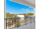 Spacious balcony with black metal railing offering city views on a sunny day at 121 E Warren Ave # 4, Tampa, FL 33602