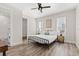 Comfortable bedroom with ample natural light, and an ensuite bathroom at 121 E Warren Ave # 4, Tampa, FL 33602