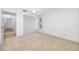 Bedroom with closet and neutral carpeting at 1211 Stony Brook Ln, Dunedin, FL 34698