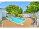 Private backyard pool area with a well-kept pool and surrounding patio at 1211 Stony Brook Ln, Dunedin, FL 34698