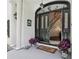 View inside front door to foyer with chandelier, staircase, and doorway to other rooms at 12433 Kelso Rd, Thonotosassa, FL 33592