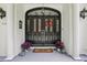 Elegant front door with stained glass and decorative wreath at 12433 Kelso Rd, Thonotosassa, FL 33592