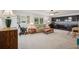 Spacious living room with bright natural light and relaxed seating arrangements at 12433 Kelso Rd, Thonotosassa, FL 33592