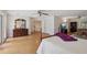 Main bedroom showing hardwood floors and natural light at 12433 Kelso Rd, Thonotosassa, FL 33592