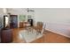 A sitting area in a main bedroom with hardwood floors at 12433 Kelso Rd, Thonotosassa, FL 33592