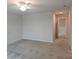 Spacious bedroom with carpet, ceiling fan and doorways leading to other rooms at 19643 Shady Oak Dr, Land O Lakes, FL 34638