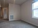 Bedroom with carpet and a window, providing lots of natural light, creating a serene space at 19643 Shady Oak Dr, Land O Lakes, FL 34638