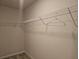 Walk-in closet featuring wire shelving for optimal storage and organization at 19643 Shady Oak Dr, Land O Lakes, FL 34638