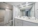 Bright bathroom with double vanity, tub, and shower; well-maintained at 19925 Gulf Blvd # 407, Indian Shores, FL 33785