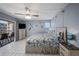Relaxing bedroom with balcony access and decorative coastal touches at 19925 Gulf Blvd # 407, Indian Shores, FL 33785