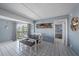 Cozy dining area with balcony views and access to bedroom at 19925 Gulf Blvd # 407, Indian Shores, FL 33785