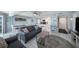 Bright and airy living room flowing into the kitchen and dining area at 19925 Gulf Blvd # 407, Indian Shores, FL 33785