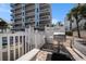 Community grilling area. The perfect spot for outdoor relaxation by the pool at 19925 Gulf Blvd # 407, Indian Shores, FL 33785
