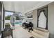 Screened-in patio with grills and access to screened-in pool at 205 W 122Nd Ave, Tampa, FL 33612