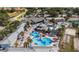 Overhead shot of the resort pools, amenities, and surrounding greenery, all within a vibrant community setting at 21007 Sunpoint Way # 203, Lutz, FL 33558