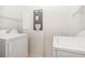 Laundry room with full size washer and dryer at 21007 Sunpoint Way # 203, Lutz, FL 33558