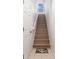 Bright staircase with neutral colors and a welcoming rug leads to upper floors at 21007 Sunpoint Way # 203, Lutz, FL 33558