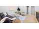 Comfortable living area featuring stylish seating, hardwood floors, and neutral decor at 218 Hesperides N St, Tampa, FL 33609