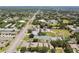 Aerial showcases properties neighboring community services, including schools, shops, and a range of roadway networks at 2216 Evans Rd, Clearwater, FL 33763
