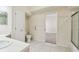 Bathroom featuring tile flooring, vanity, and a glass enclosed shower at 2216 Evans Rd, Clearwater, FL 33763