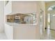Open-concept kitchen with ample counter space, modern appliances, and a seamless transition to the dining area at 2216 Evans Rd, Clearwater, FL 33763
