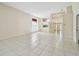 Spacious living room showcasing tiled floors, neutral tones, and natural light at 2216 Evans Rd, Clearwater, FL 33763