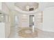 Bright open living space with tile flooring, recessed lighting, and easy access to other rooms at 2216 Evans Rd, Clearwater, FL 33763
