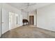 Main bedroom featuring closet, adjacent bath, and an antique desk in the corner at 2216 Evans Rd, Clearwater, FL 33763