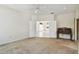 View of the main bedroom leading to the living area, showcasing an antique desk at 2216 Evans Rd, Clearwater, FL 33763