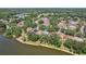 Lakefront homes surrounded by greenery, showcasing the neighborhood's serene setting at 2617 Heatherwood Dr, Tampa, FL 33618