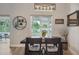 Cozy dining area offers bright natural light and a scenic view of the water at 2617 Heatherwood Dr, Tampa, FL 33618