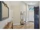 Bright foyer with light wood flooring, high ceilings, and a charming entry table at 2617 Heatherwood Dr, Tampa, FL 33618
