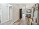 Long Foyer with view to living room and kitchen at 2617 Heatherwood Dr, Tampa, FL 33618