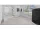 Cozy bedroom with window and closet covered with black tarp at 33255 Kateland Dr, Wesley Chapel, FL 33545