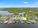 Aerial view of waterfront homes, canals, and boat docks, showcasing the community at 4012 Marine Pkwy, New Port Richey, FL 34652