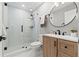 Modern bathroom featuring a glass shower and vanity with a vessel sink at 4012 Marine Pkwy, New Port Richey, FL 34652