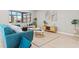 Cozy living room with stylish furniture, decor, large windows and bright light at 4012 Marine Pkwy, New Port Richey, FL 34652