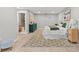 Main bedroom with an en-suite bathroom and neutral design elements at 4012 Marine Pkwy, New Port Richey, FL 34652
