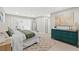Comfortable main bedroom with views to the en-suite bathroom and office space at 4012 Marine Pkwy, New Port Richey, FL 34652