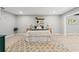 Calm main bedroom with comfortable bed, neutral tones, and minimalist decor at 4012 Marine Pkwy, New Port Richey, FL 34652