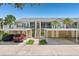 Inviting condo with assigned parking and landscaped surroundings providing a comfortable living experience at 404 Laurel Lake Dr # 101, Venice, FL 34292