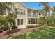 This home features an upper balcony, a well manicured yard, and plenty of Florida sunshine at 404 Laurel Lake Dr # 101, Venice, FL 34292
