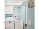Laundry room equipped with a washing machine and dryer at 404 Laurel Lake Dr # 101, Venice, FL 34292