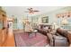 Spacious living room with hardwood floors and an open layout, ideal for entertaining and relaxing at 404 Laurel Lake Dr # 101, Venice, FL 34292