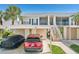 Assigned covered parking with easy access to units, providing convenience and protection for vehicles at 404 Laurel Lake Dr # 101, Venice, FL 34292