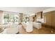 Elegant kitchen and living space with marble islands and great natural light at 4103 W Knights Ave, Tampa, FL 33611